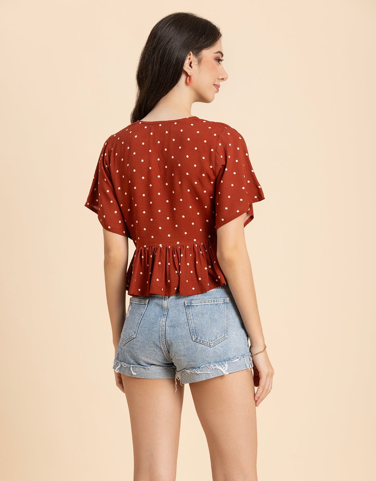 Printed V-Neck Peplum Top