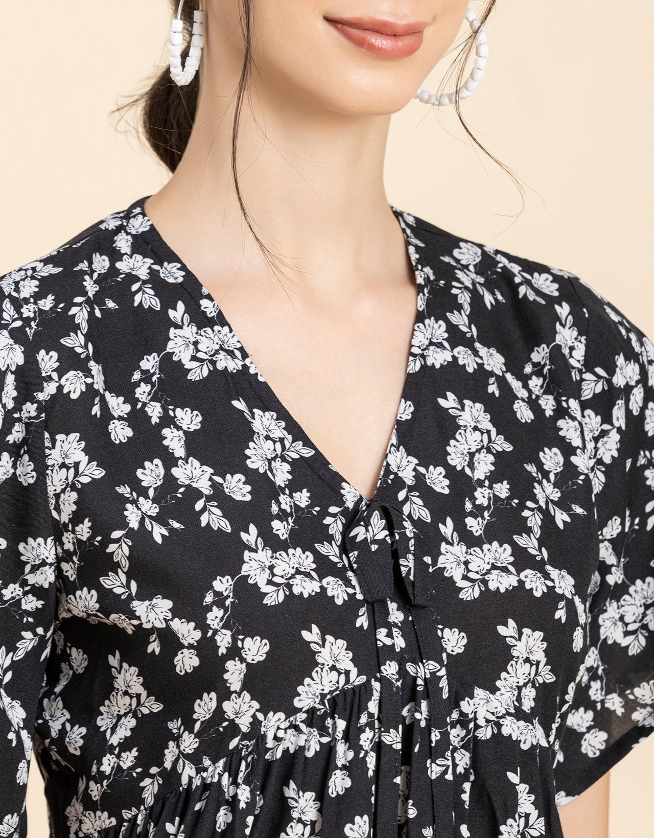 Printed V-Neck Peplum Top
