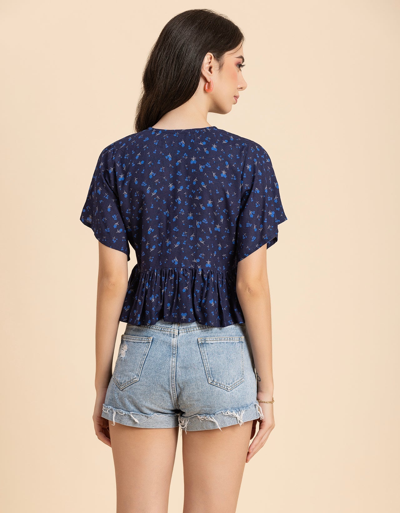 Printed V-Neck Peplum Top