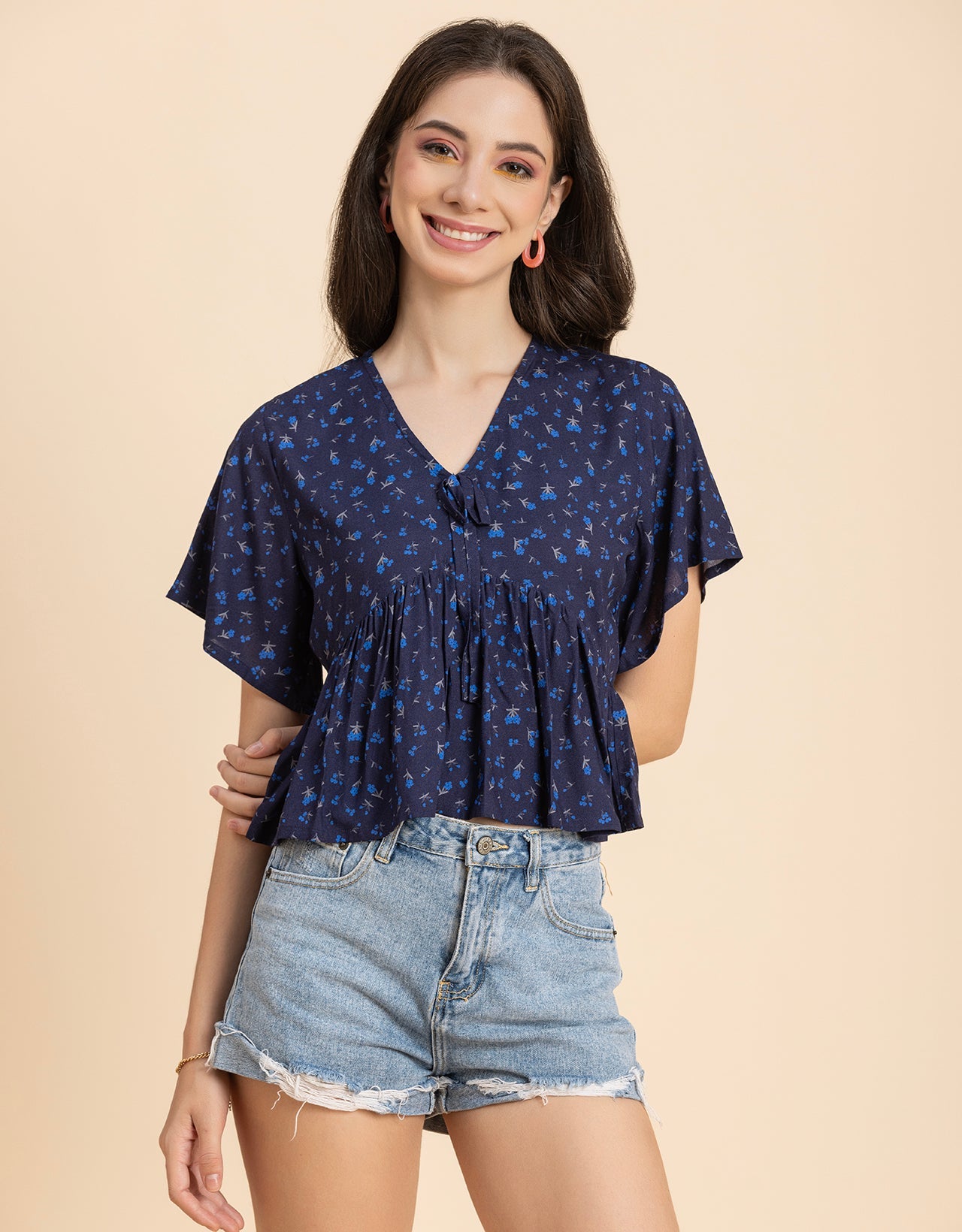 Printed V-Neck Peplum Top